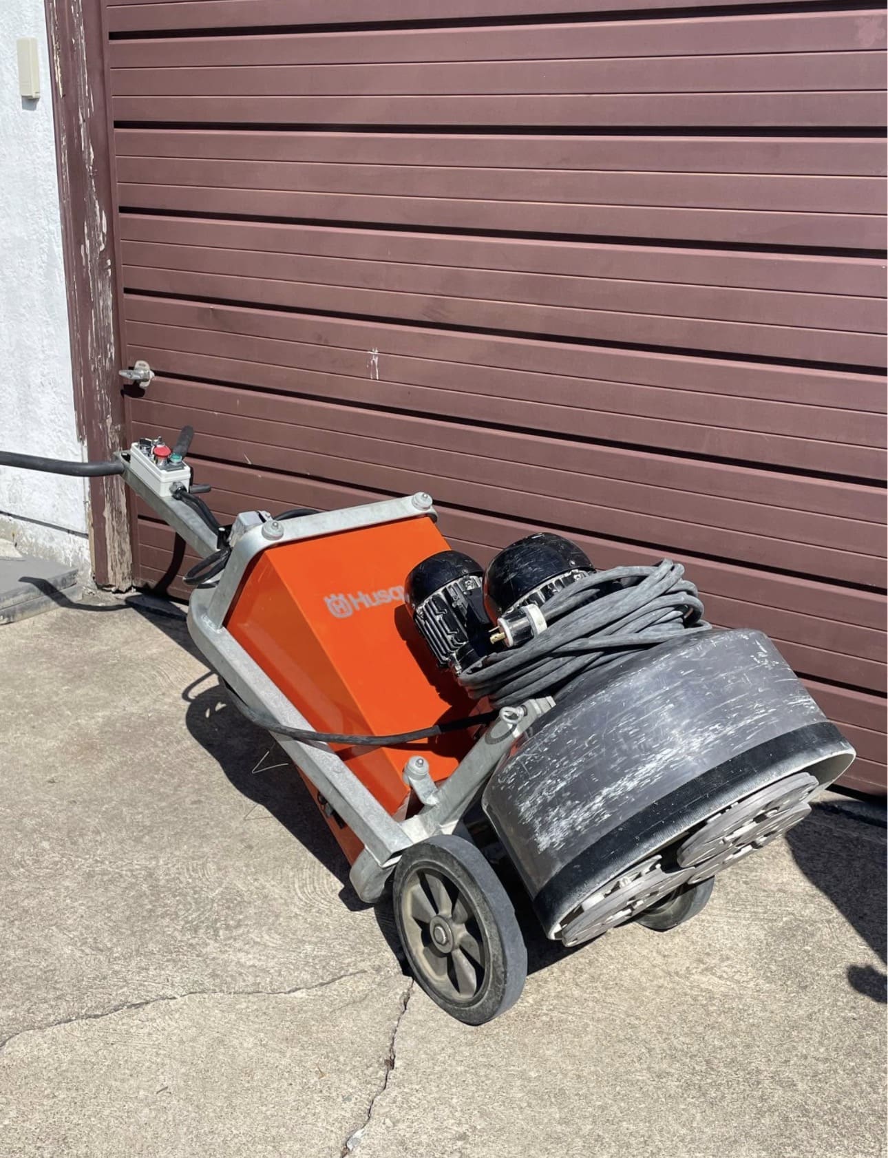 Husqvarna floor grinder with grinding head and cables