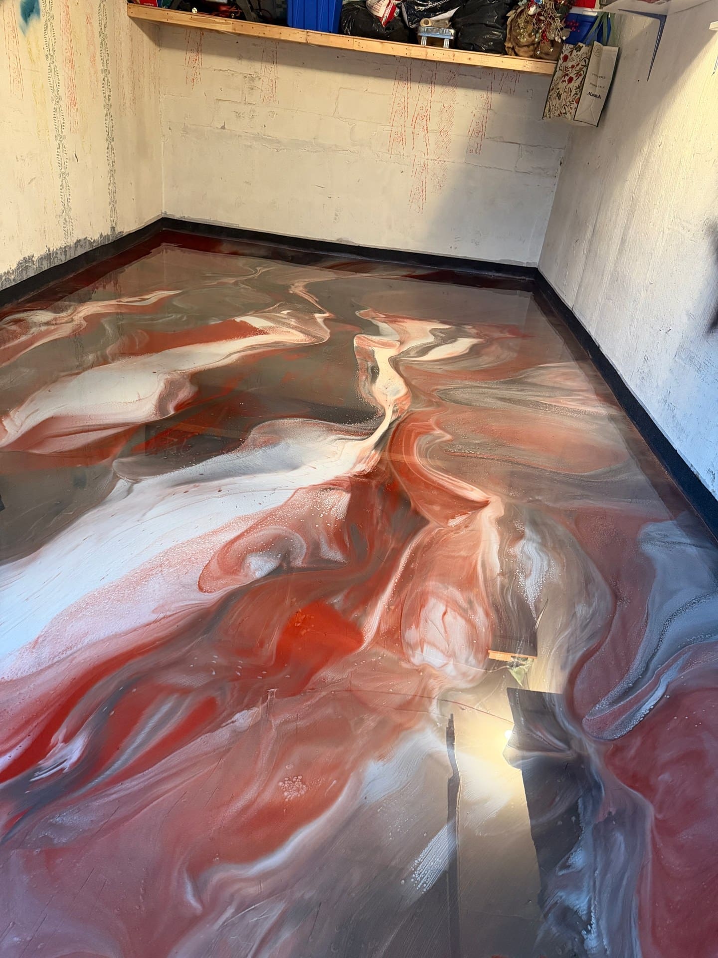 Finished red, white and grey metallic epoxy floor